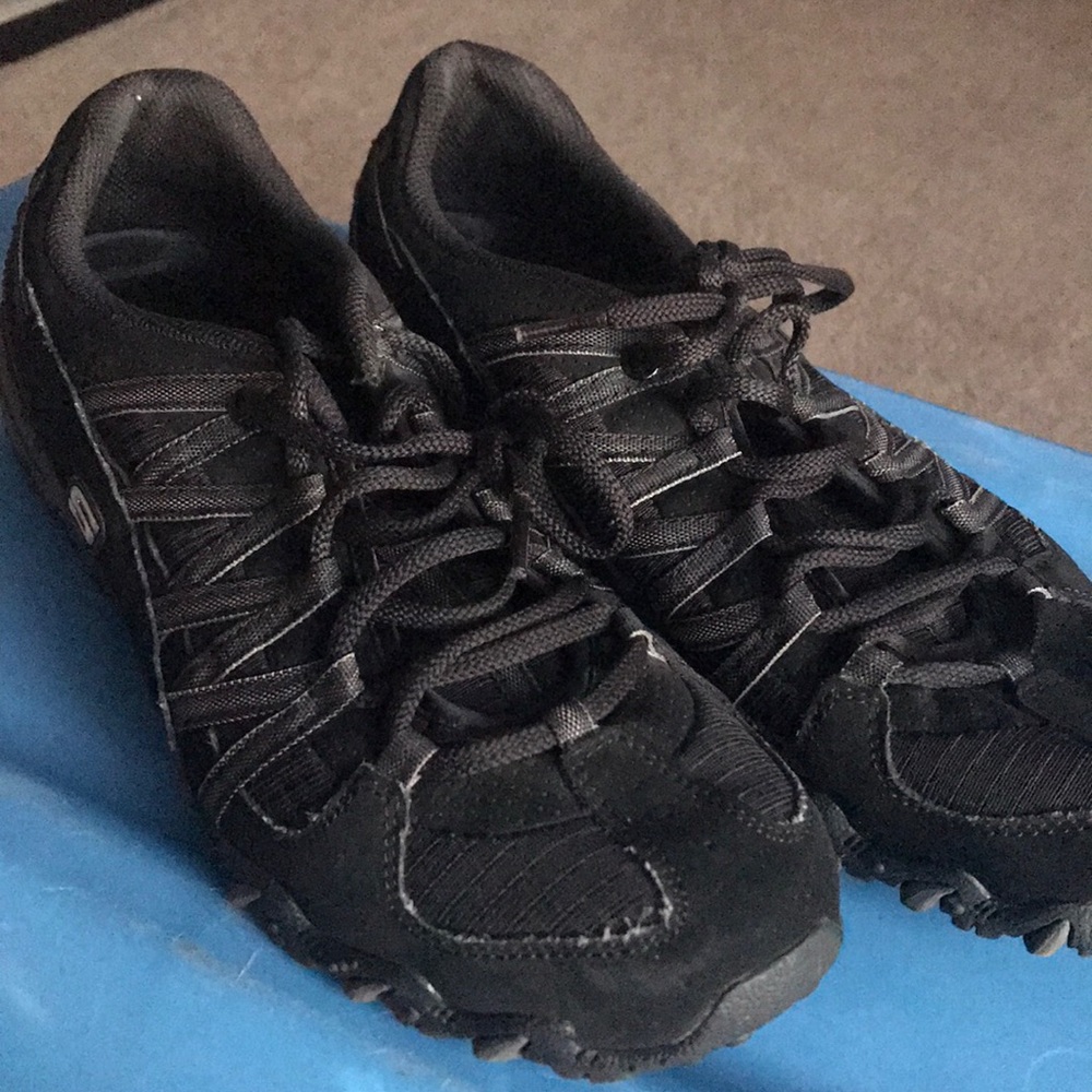 Black sketcher loafers